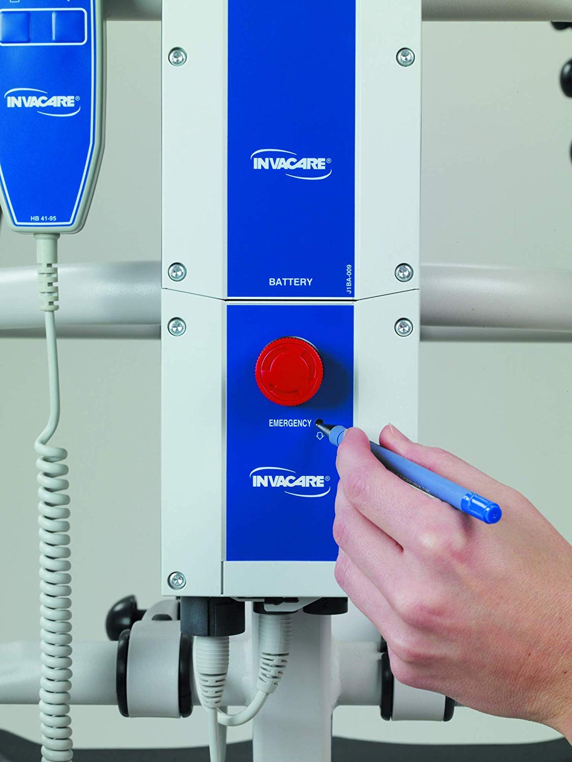 Close-up image of the removable battery with an emergency "OFF" button for Invacare's RPL450-1 Reliant Electric Patient lift against a white background.